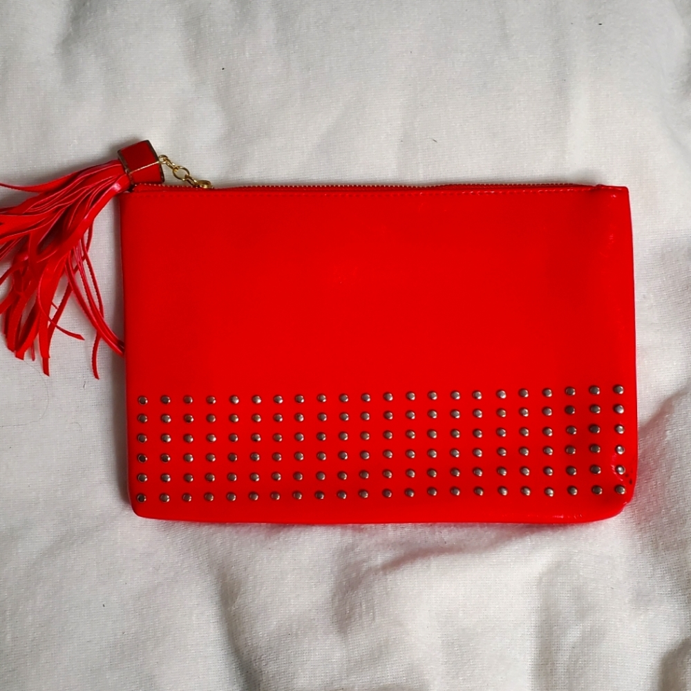 Faux Leather Red Clutch with studded embellishments and tassel zipper closure